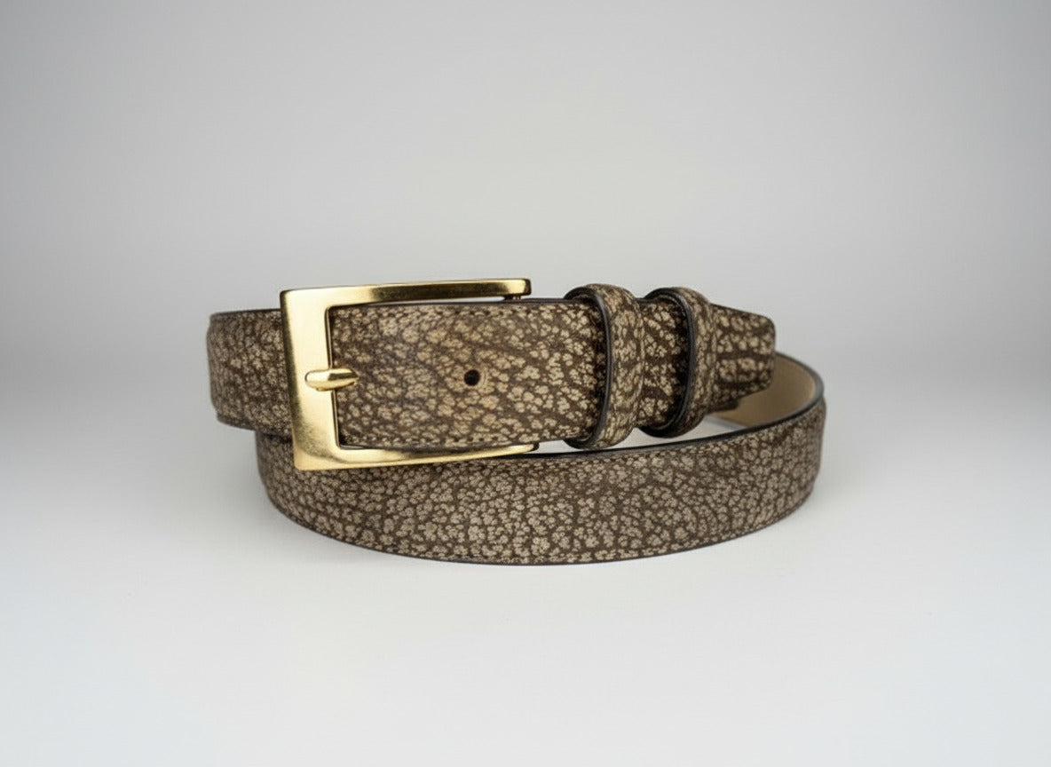 Floral-patterned belt with a gold buckle on a white background