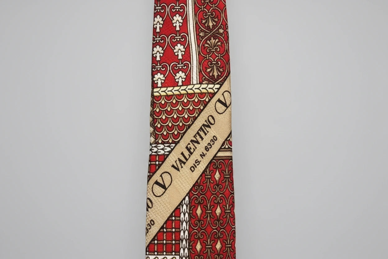 Valentino patterned tie on a gray background