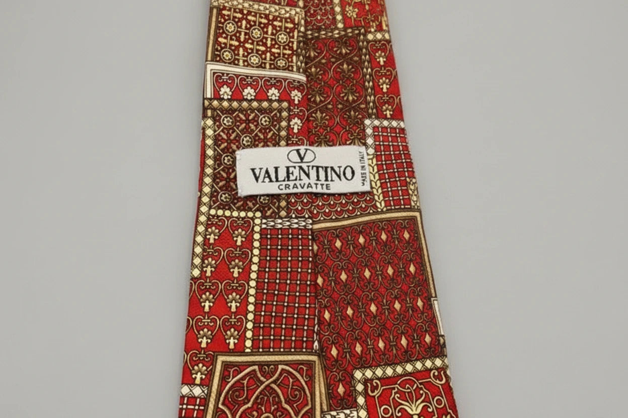 Valentino cravat with intricate red and gold pattern